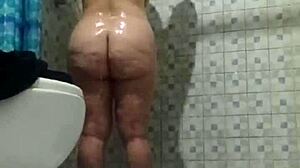 Latina mature stepmother spied in bathroom shower.
