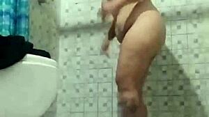 Latina mature stepmother spied in bathroom shower.