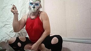 Transvestite plays with dildo in intriguing ways