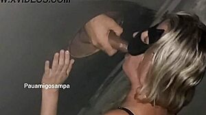 cuckold takes blonde wife to glory hole for black cocks