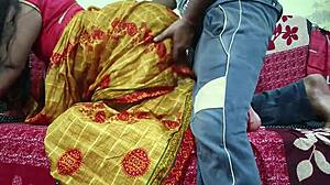 पीली साड़ी वाली भाभी देवर को जोर से चोदती है।