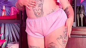 Teasing In Silk Pajamas With Huge Tattoo And Natural Tits