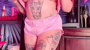 Teasing In Silk Pajamas With Huge Tattoo And Natural Tits