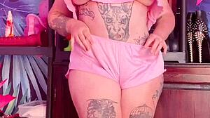 Teasing In Silk Pajamas With Huge Tattoo And Natural Tits