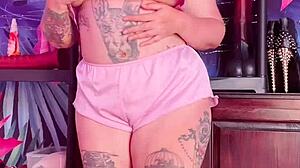 Teasing In Silk Pajamas With Huge Tattoo And Natural Tits