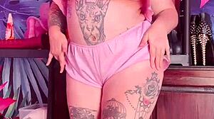 Teasing In Silk Pajamas With Huge Tattoo And Natural Tits