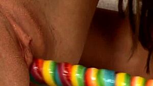 Hot beauties engage in playful activities with petite teens in 69 position