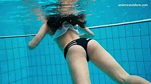 Horny teen gets naked fast by the pool, showing her tight pussy