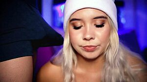 Horny blonde plays with her boyfriend's cock through his boxers, teasing him so much.