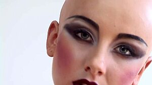 I admire Luca Bella's bald head in hot latex corset