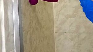 She indulges in passionate sex with her dildo in the steamy bathroom, exploring her deepest desires