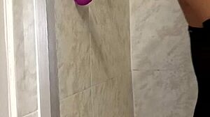 She indulges in passionate sex with her dildo in the steamy bathroom, exploring her deepest desires