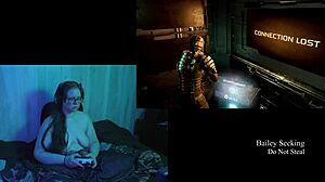 naked brunette plays deadspace with big natural tits exposed