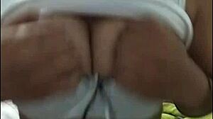 Big Tits Webcam Show Features Busty Woman Displaying Her Assets.