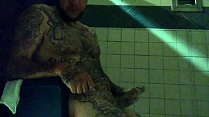 stroking big tattooed white dick in shower