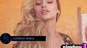 Lindsay Marie's bra slips down revealing her beautiful small tits in intense softcore scene