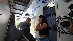 Monique Bertolini gives tour in motorhome workshop.