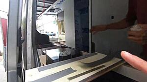 Monique Bertolini gives tour in motorhome workshop.