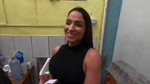 Monique Bertolini gives tour in motorhome workshop.