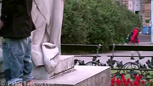 Look at this cute teen getting threesome blowjob by the statue! So hot!