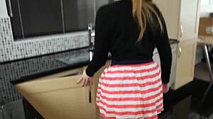 Redhead with Saggy Boobs Caught on Voyeur in Kitchen