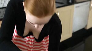 Redhead with Saggy Boobs Caught on Voyeur in Kitchen