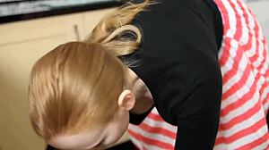 Redhead with Saggy Boobs Caught on Voyeur in Kitchen