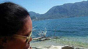 Excited wife sucking me on beach