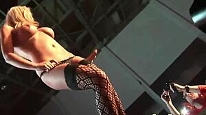 German stepmom strips naked on stage for wild public dancing. Her flexible moves stun the crowd.