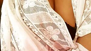 Latina sexy milf shows off her natural tits and boobs.