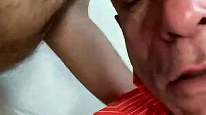 Watch him gagging on that hairy cock from behind