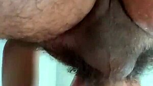 Watch him gagging on that hairy cock from behind