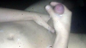 Gay guy cums on feet in casual scene