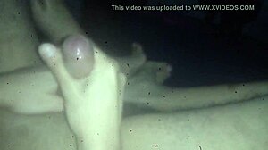 Gay guy cums on feet in casual scene