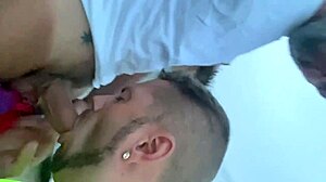 guy gives blowjob to another on public gay beach