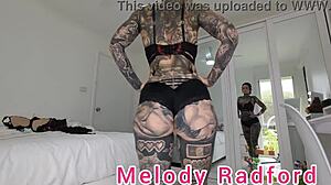 melody radford tries on black and red lingerie, showing off her big ass and tits in closeup, what do you think?