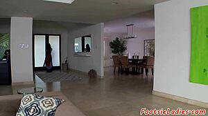 Asian babe receives doggy style fuck with footjob