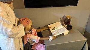 Horny man distracts silicone sex doll from reading a book for passionate encounter