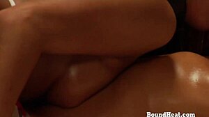 yo, check this lesbian slave in chains giving a sensual massage to her dominant madame! 🔥💋