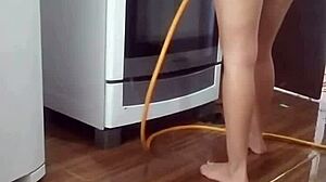 Maid Washes Stove Naked in Secret Video