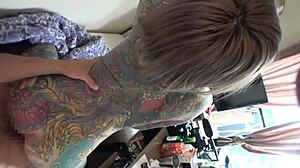 Tattooed Japanese Woman Licks Erect Penis After Passionate Kiss