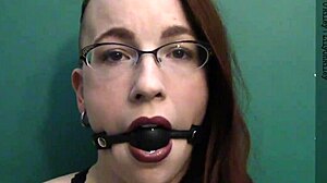 Dark lipstick ballgag drooling with intense eye contact