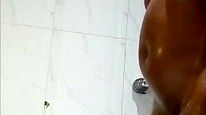 Fine-ass girlfriend shows off her sexy body under the hotel shower.