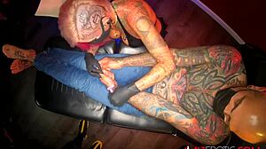Evilyn Ink fucks Sascha after giving him a tattoo with riding and titty fuck