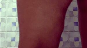 Hidden cam shows mature latina flashing pussy in Lima hotel bathroom