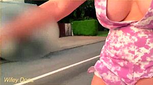 wife rides her bike in public, flashing cleavage and big tits on a dare