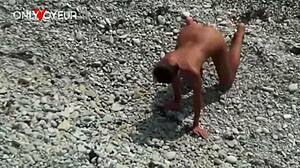 beach voyeur couple with babe naked and buttplug in public