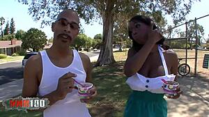 ebony goddess showcasing giant natural boobs in a scene