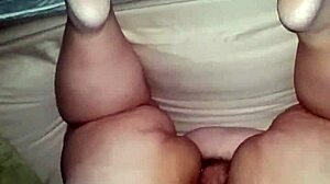 The bbw milf fucks herself with a huge dildo, focusing on her big ass