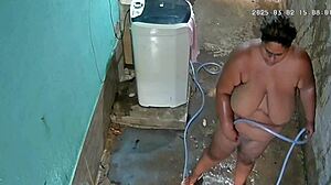 Did hidden camera catch stepmom showering and flashing in the backyard?